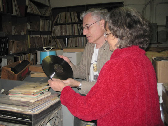 Nathan Tinanoff and Marlene Englander (Jack saul's daughter) examine records