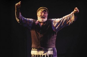 Theodore Bikel on stage as Tevye in Fiddler on the Roof. 