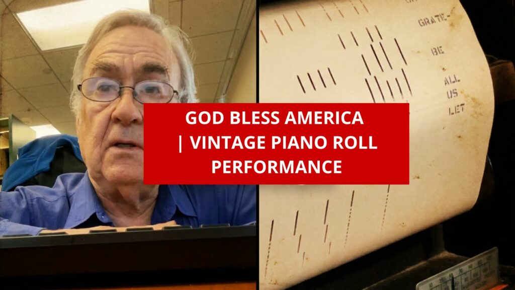 Vintage piano roll of Irving Berlin’s God Bless America displayed on a player piano spool, evoking early 20th-century mechanical music technology and patriotic American musical heritage.